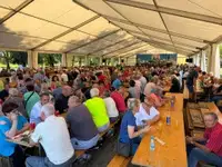FOTO: Pod šotorom ob Družmirskem jezeru poteka 4. srečanje upokojencev  