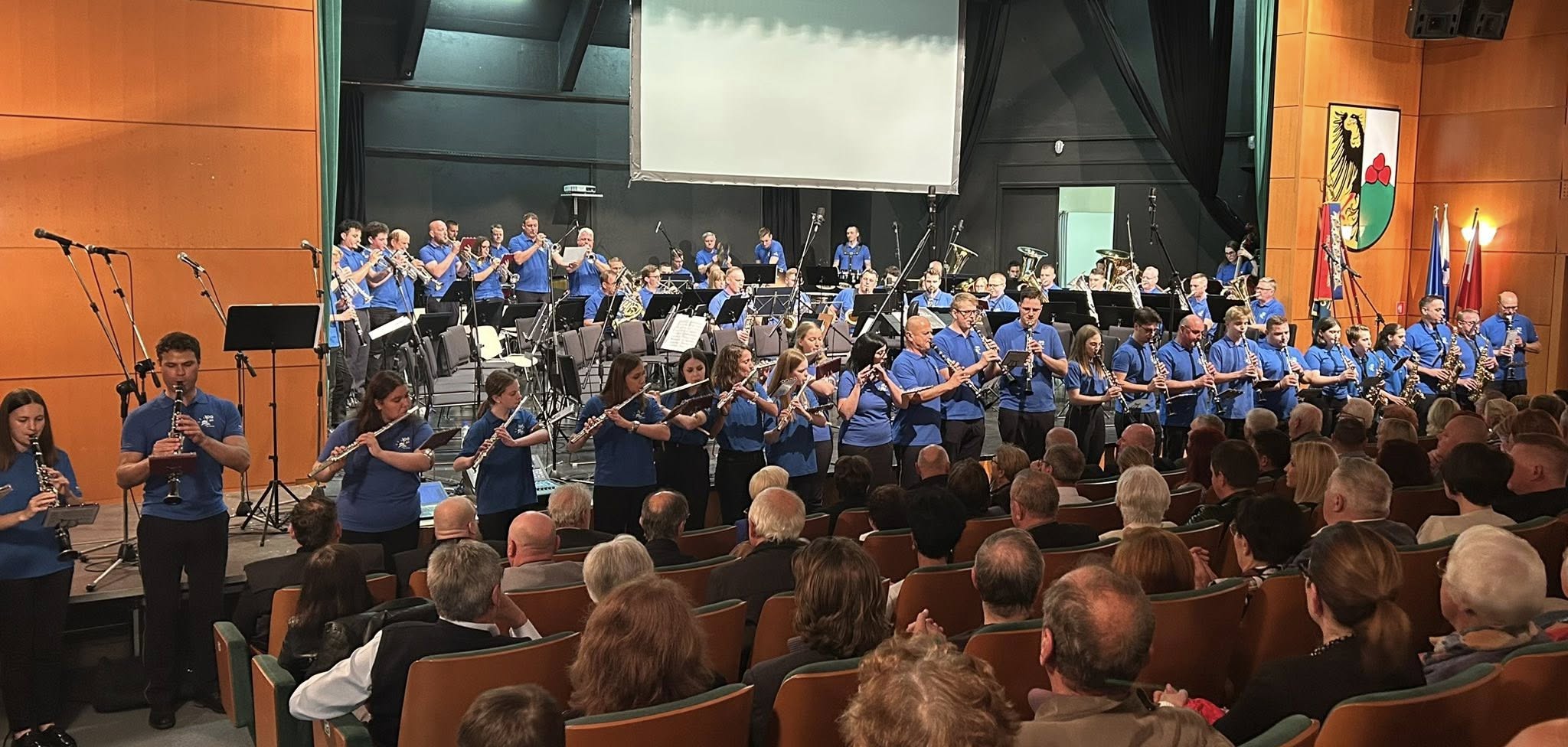 100 let melodij, prijateljstva in predanosti: Pihalni orkester Zarja Šoštanj praznuje